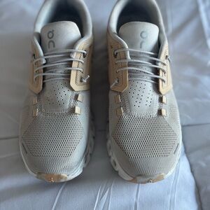 On Running Gray and Tan Sneakers